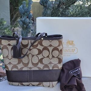 NWOT Coach Tan and Brown Reversible Signature Tote w/orginal Box & dust Bag